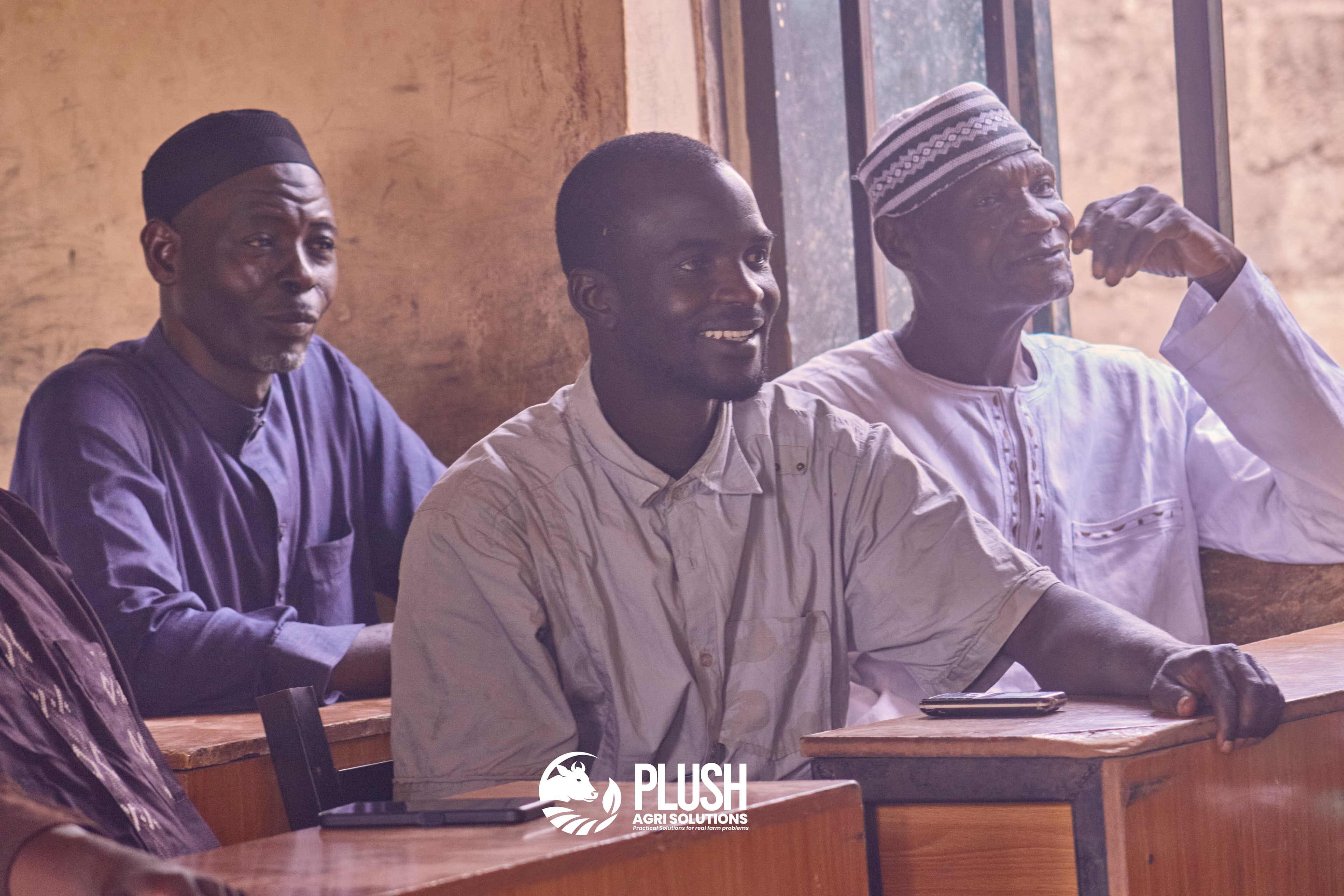 Farmers listening during a Plush Agri Solutions advisory session in Danhonu 1