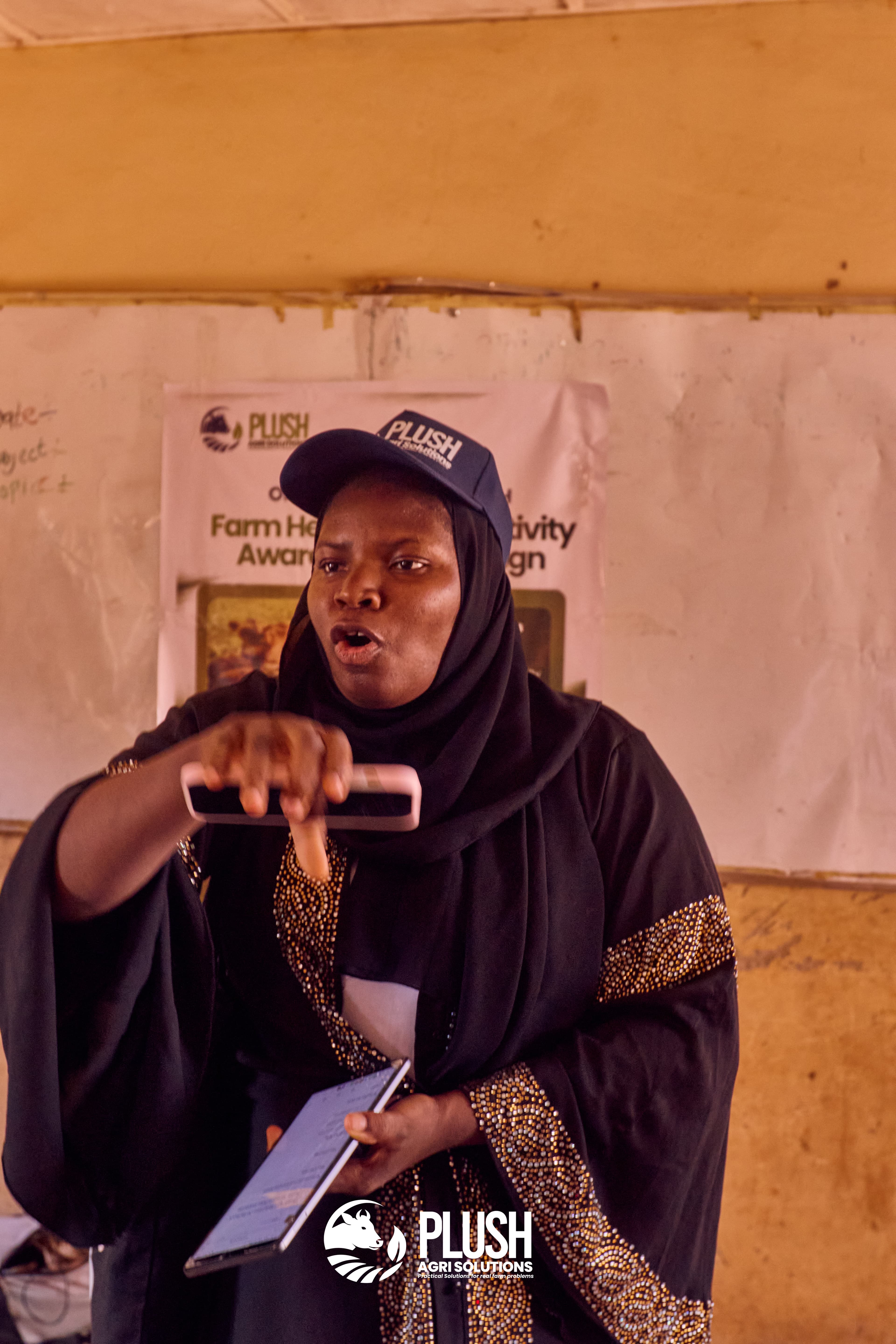 Plush Agri Solutions team member leading a farmer training session
